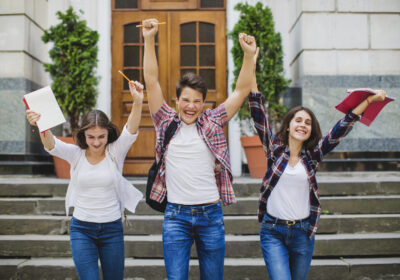 cheerful-students-celebrating