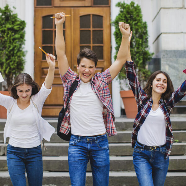 cheerful-students-celebrating
